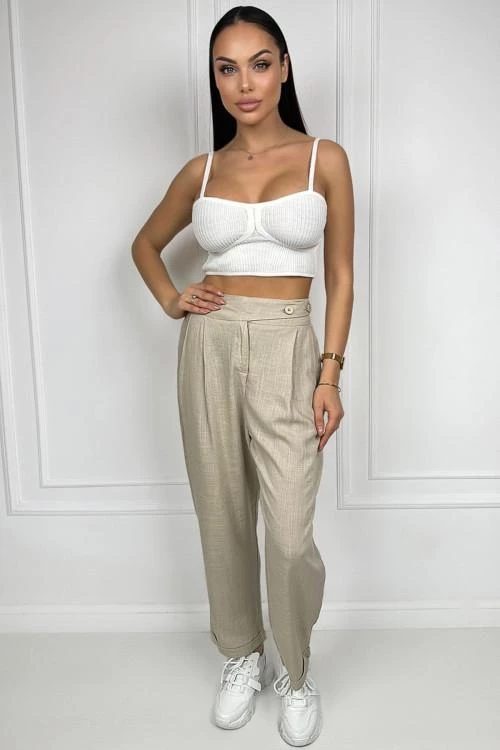 Women's trousers with asymmetric buttons