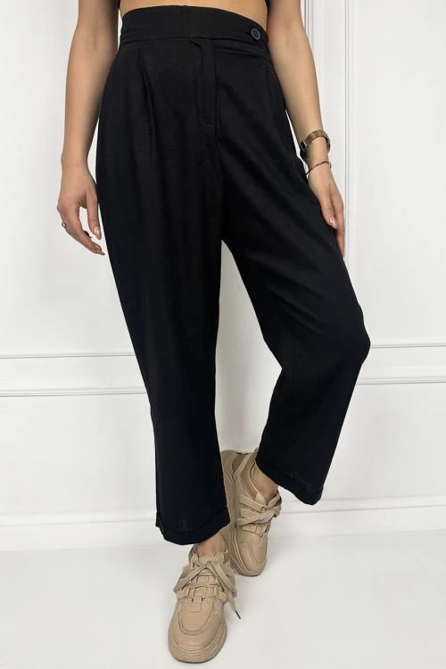 Women's trousers with asymmetric buttons